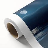 Vibrant rolled canvas artwork showcasing a serene seascape design, featuring calming blue and green hues, elegantly packaged in a protective cardboard tube.