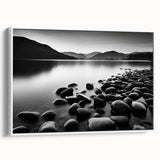 Framed canvas wall art showcasing a serene seascape design, featuring calming blue and white tones with a sleek white frame, ideal for coastal-themed decor.