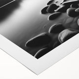 Rolled canvas artwork showcasing a serene seascape design with soft blues and greens, ideal for home decor, delivered securely in a protective tube.