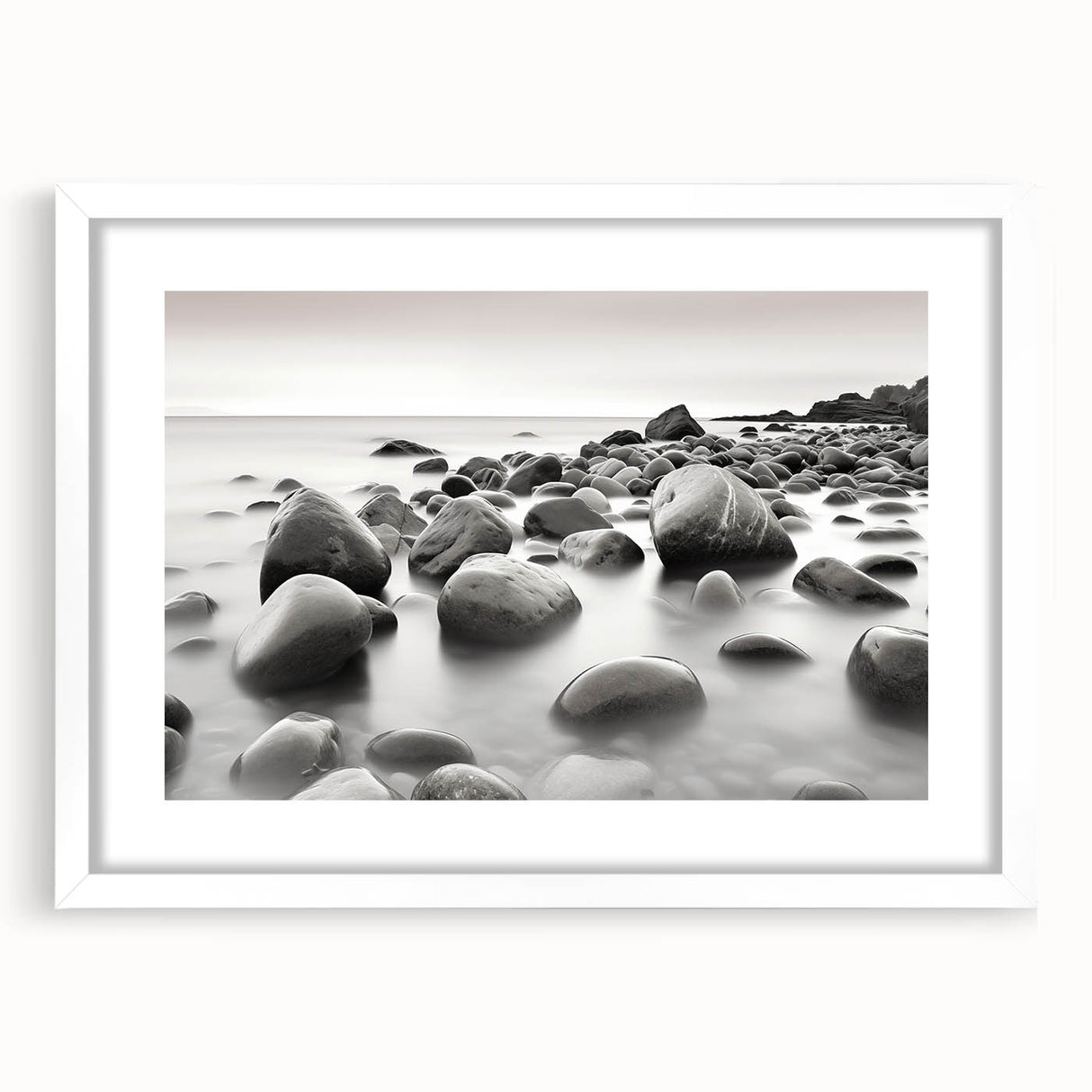 Framed landscape wall art collection featuring serene seascapes in soft blue and white tones, set in a modern white frame with a mat for an elegant finish.