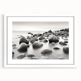 Framed landscape wall art collection featuring serene seascapes in soft blue and white tones, set in a modern white frame with a mat for an elegant finish.