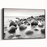 Framed canvas wall art showcasing a serene seascape design with vibrant blues and greens, presented in a sleek black frame, perfect for modern decor.