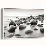 Framed canvas wall art from the Landscapes & Seascapes collection, showcasing a serene ocean view with soft blue tones and white accents, perfect for coastal decor.