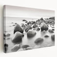 Stretched canvas wall art showcasing a serene seascape design with vibrant blues and soft whites, elegantly framed and ready to enhance modern interiors.