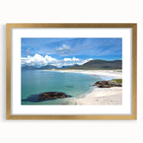 Elegant framed wall art collection showcasing vibrant seascape designs, featuring a gold frame and matting, perfect for coastal decor enthusiasts.