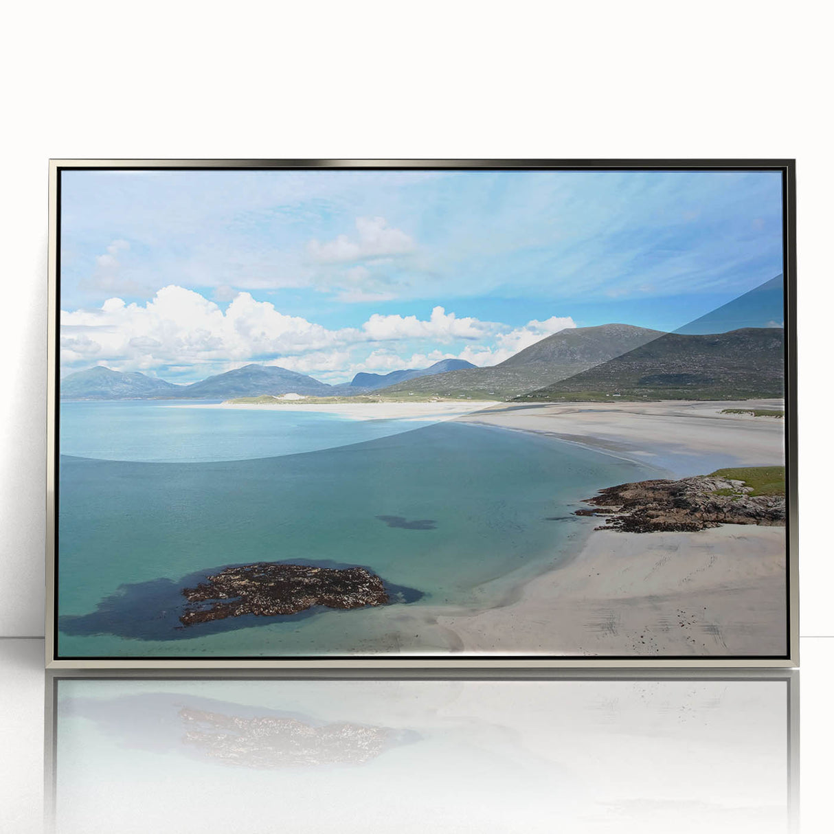 Framed acrylic wall art featuring a serene seascape design, with silver accents, showcasing vibrant colors and calming ocean waves, perfect for modern home decor.