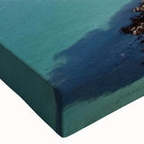 Close-up of a vibrant stretched canvas print showcasing a serene seascape design, with rich colors and detailed textures, perfect for enhancing any living space.