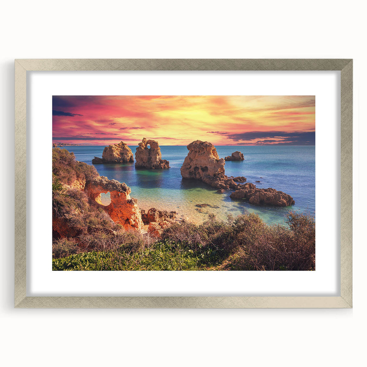 Framed wall art featuring a serene seascape design with silver matting, showcasing gentle waves and a tranquil sky, perfect for home decor.