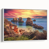 Framed canvas wall art showcasing a serene seascape design with soft blue and white tones, elegantly displayed in a modern white frame, perfect for coastal decor.