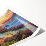 Vibrant rolled print of a serene seascape, showcasing a sunset over tranquil waters, perfect for home decor. The artwork features rich blues and oranges, capturing a peaceful coastal atmosphere. Ideal for enhancing living spaces with a touch of nature's beauty.