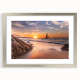 Framed wall art from the Landscapes & Seascapes collection, showcasing a serene coastal scene with gentle waves, silver matting, and elegant design. Perfect for enhancing home decor.