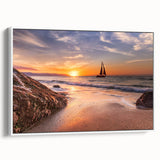 Framed canvas artwork showcasing a serene seascape design with soft blue and white tones, presented in a sleek white frame, perfect for coastal decor.