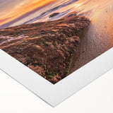 Vibrant rolled canvas artwork showcasing a serene seascape design with soft blues and greens, elegantly packaged in a protective cardboard tube for easy display.