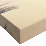 Close-up of a stretched canvas artwork showcasing a serene seascape design, featuring vibrant blues and greens. Ideal for coastal-themed decor, this wall art adds tranquility to any space.