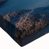 Close-up of a vibrant seascape wall art design on stretched canvas, showcasing rich blues and greens depicting waves and coastal scenery, ideal for home decor.