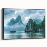 Framed canvas wall art collection showcasing a serene seascape design, featuring calming blue and green hues, displayed from a side view with a sleek black frame.