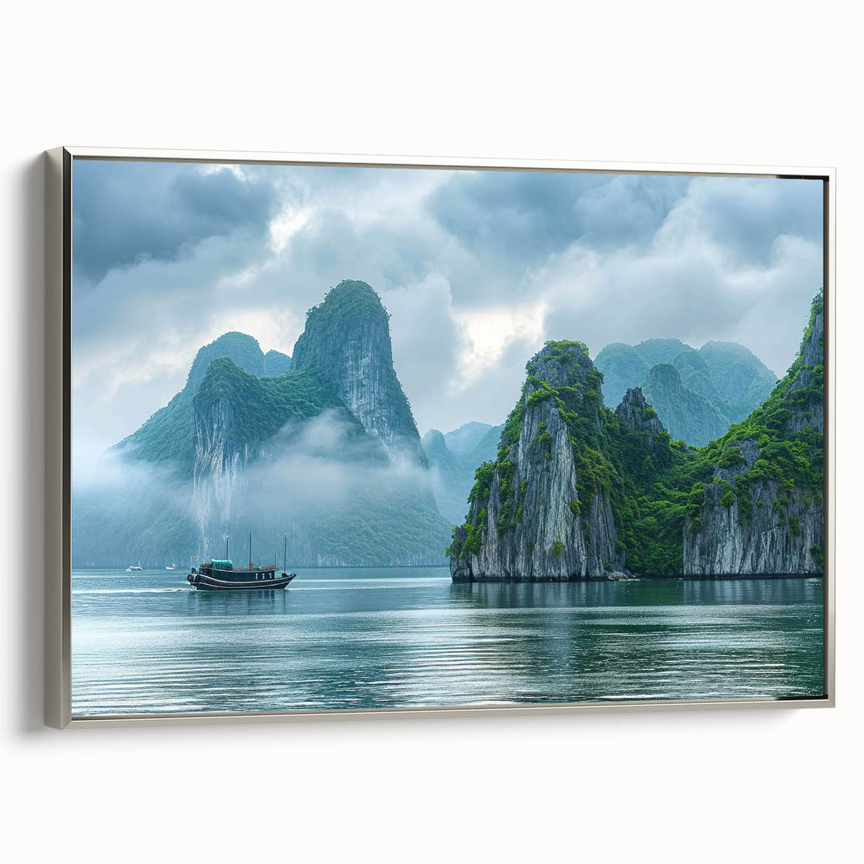 Framed canvas wall art showcasing a serene seascape design with vibrant blue and silver hues, elegantly displayed in a silver frame, perfect for home decor.