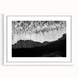 Framed wall art collection showcasing a serene seascape design, featuring soft blue and white tones, elegantly matted and displayed in a sleek white frame. Perfect for coastal decor enthusiasts.