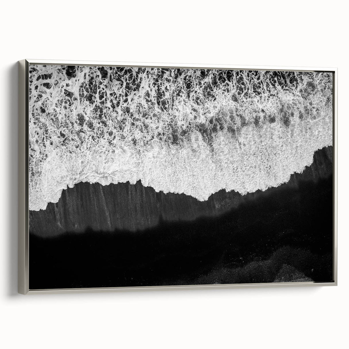 Framed wall art collection of seascapes and landscapes in a silver frame, showcasing serene coastal scenes, perfect for home decor. Ideal for enhancing interior spaces.