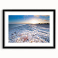 Framed wall art collection showcasing serene seascapes and landscapes in a black matte frame, enhancing any decor with a modern touch. Perfect for beach-themed interiors.