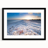 Framed wall art collection showcasing serene seascapes and landscapes in a black matte frame, enhancing any decor with a modern touch. Perfect for beach-themed interiors.