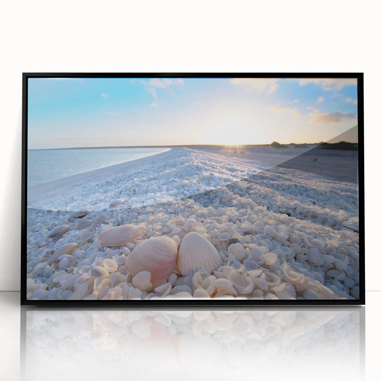 Framed acrylic wall art collection showcasing a serene seascape design, featuring calming blue and green hues, presented in a sleek black frame for modern decor. Ideal for coastal-themed interiors.