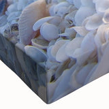 Close-up of a stretched canvas wall art piece showcasing a vibrant seascape design with calming blue and green hues, perfect for coastal home decor.