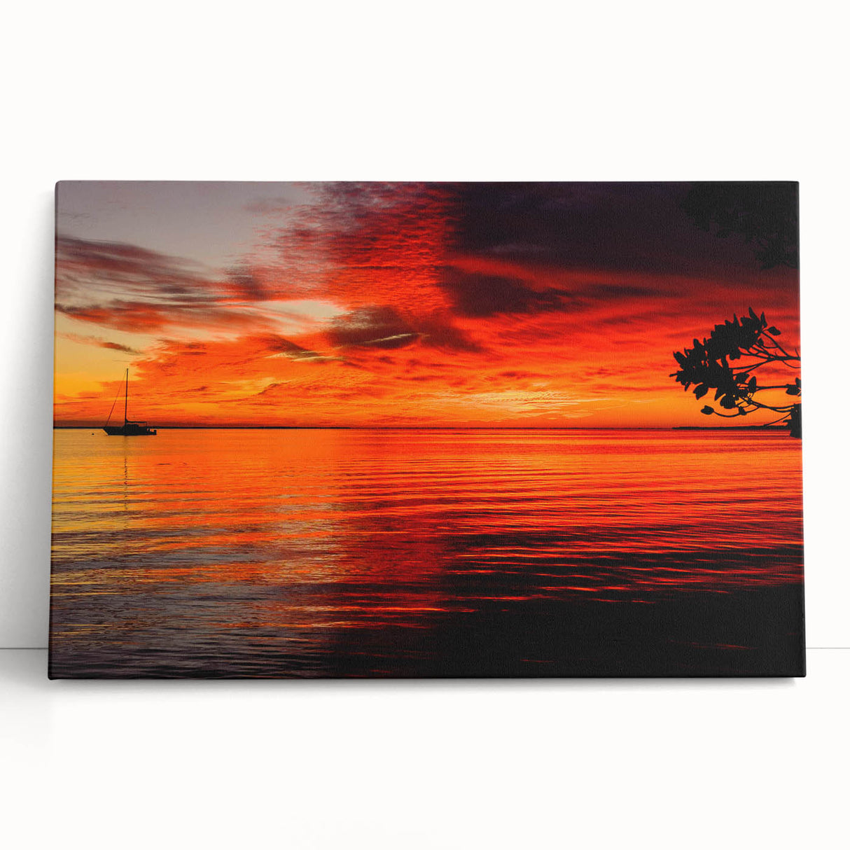Stretched canvas wall art showcasing a vibrant seascape design, featuring dynamic blues and greens with gentle waves, leaning against a textured wall for a coastal aesthetic.