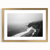 Framed wall art collection featuring a coastal landscape design with a gold mat and frame, showcasing serene ocean waves and a vibrant sunset. Perfect for enhancing home decor.