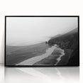 Framed acrylic wall art featuring a serene seascape design in vibrant colors, set against a sleek black frame, perfect for modern home decor. Ideal for enhancing coastal-themed interiors with its calming ocean hues and artistic details.