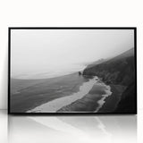 Framed acrylic wall art featuring a serene seascape design in vibrant colors, set against a sleek black frame, perfect for modern home decor. Ideal for enhancing coastal-themed interiors with its calming ocean hues and artistic details.
