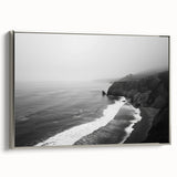 Framed canvas wall art showcasing a serene seascape with soft blue and silver tones, elegantly displayed from a side view, perfect for enhancing modern decor.