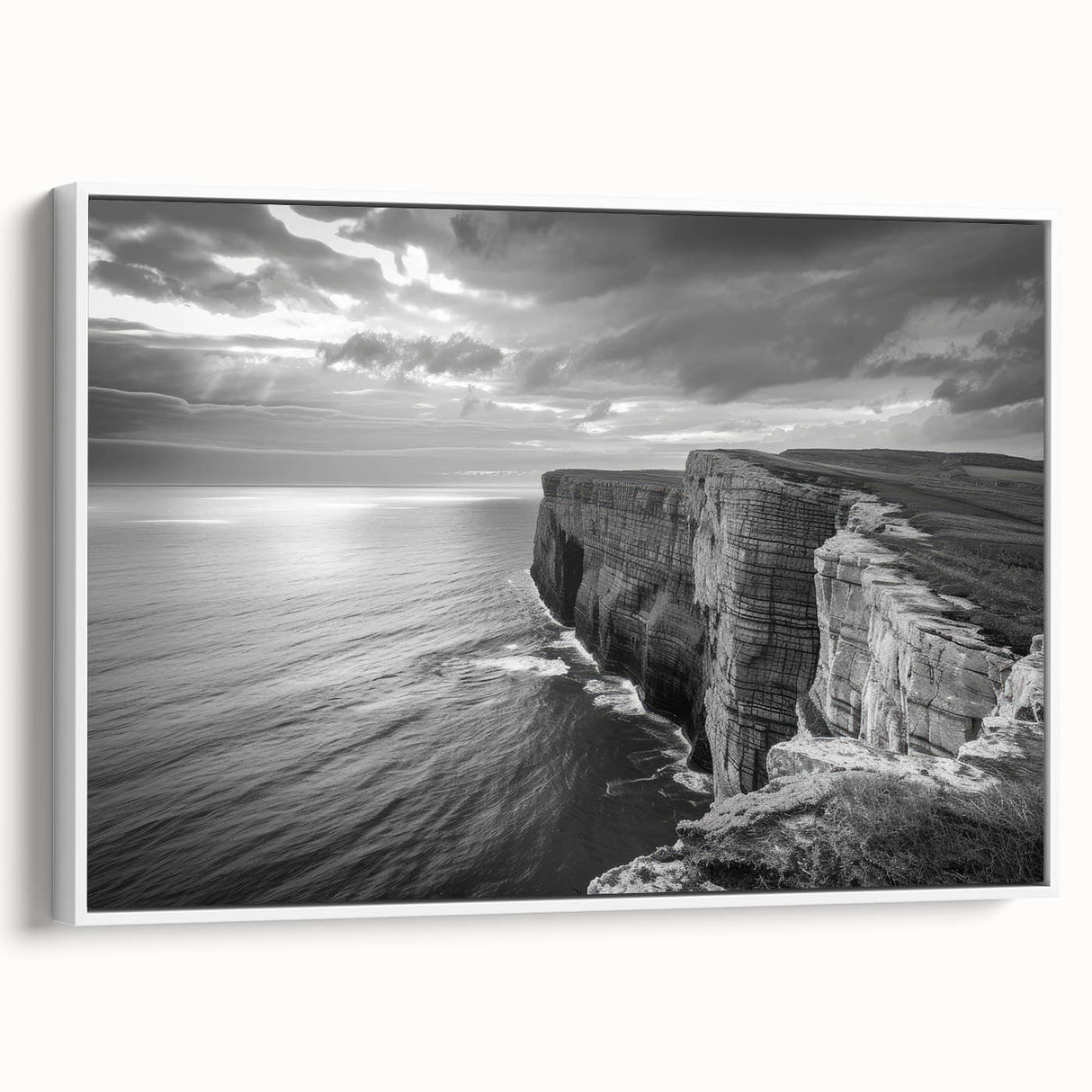 Framed canvas wall art showcasing a serene seascape design, featuring calming blue and white tones, elegantly displayed from the side with a minimalist white frame, ideal for coastal-themed decor.