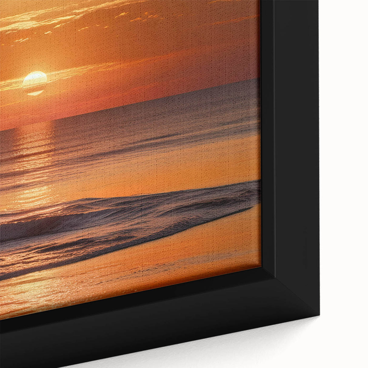 Close-up of a framed canvas artwork showcasing a vibrant seascape design with waves and sunset hues, ideal for home decor and coastal themes.