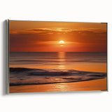 Framed wall art featuring a serene seascape design with calming blue tones, elegantly bordered in silver, ideal for enhancing modern home decor.