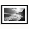 Framed black wall art featuring a serene seascape design with a mat, showcasing waves and a tranquil ocean scene, ideal for coastal home decor.