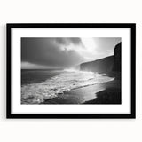 Framed black wall art featuring a serene seascape design with a mat, showcasing waves and a tranquil ocean scene, ideal for coastal home decor.