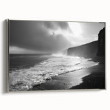 Framed canvas wall art showcasing a serene seascape design with soft blues and whites, elegantly bordered in silver, ideal for coastal-themed decor.