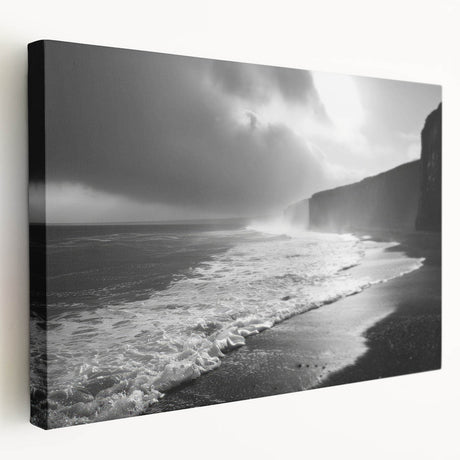 Stretched canvas artwork depicting a vibrant seascape with bold blues and greens, showcasing waves crashing against a rocky shore, ideal for coastal-themed decor.