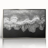 Framed acrylic wall art displaying a serene seascape landscape design with silver accents, perfect for modern home decor. The piece adds elegance to any room.