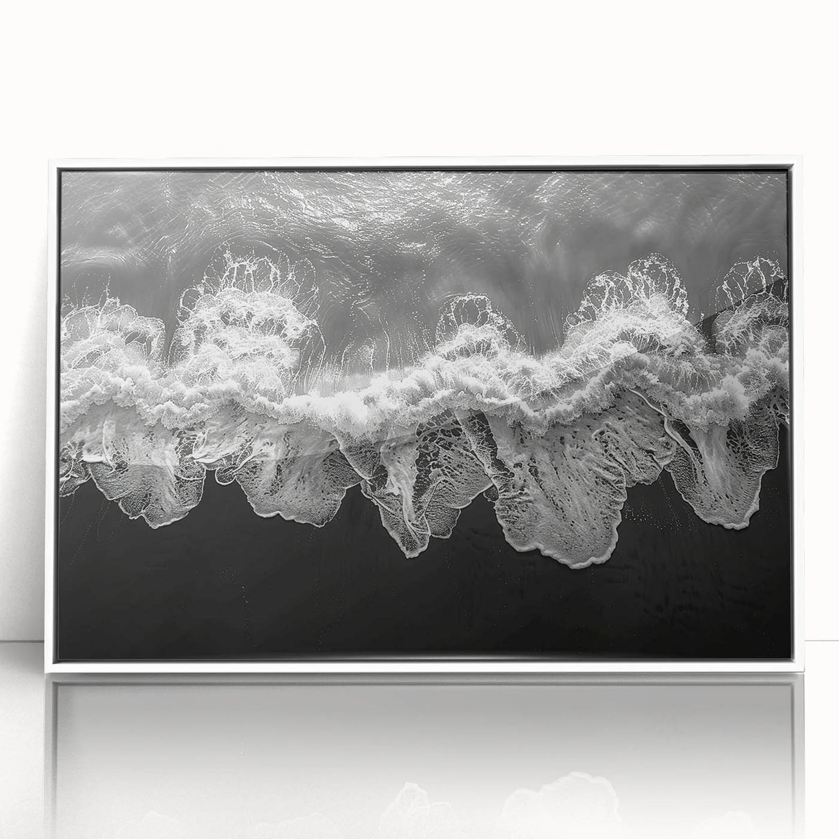 Framed wall art collection showcasing a serene seascape design with vibrant blue ocean hues, elegantly displayed in a white frame, perfect for enhancing modern decor.