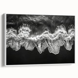 Framed canvas wall art from the Landscapes & Seascapes collection featuring serene ocean waves and a calming blue color palette, displayed in a stylish white frame.