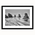 Framed wall art featuring a serene seascape design in a black frame with a white mat, showcasing calming ocean waves and a clear blue sky, perfect for home decor.
