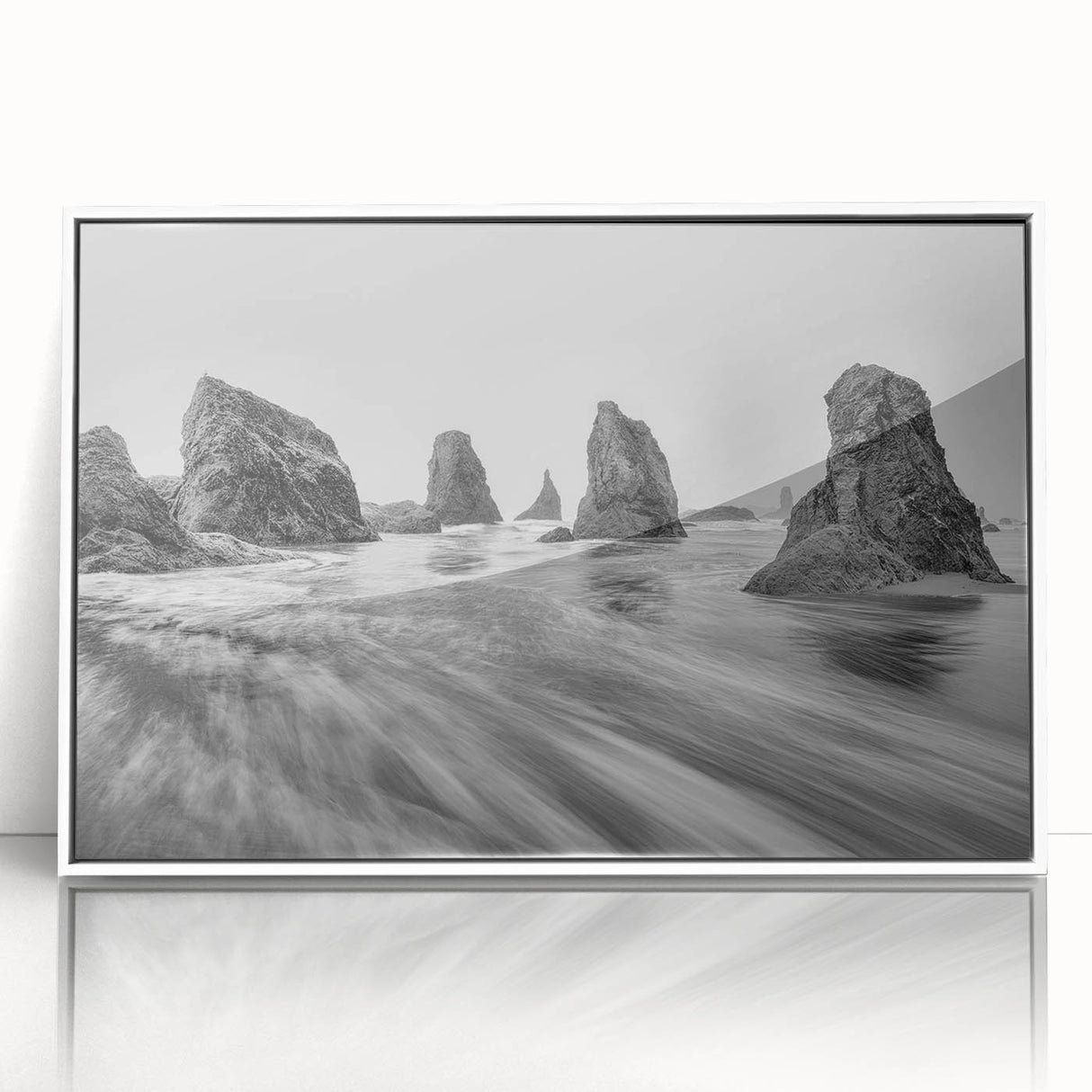 Framed acrylic wall art collection showcasing a serene seascape design with soft hues of blue and white, ideal for coastal-themed interior decor.