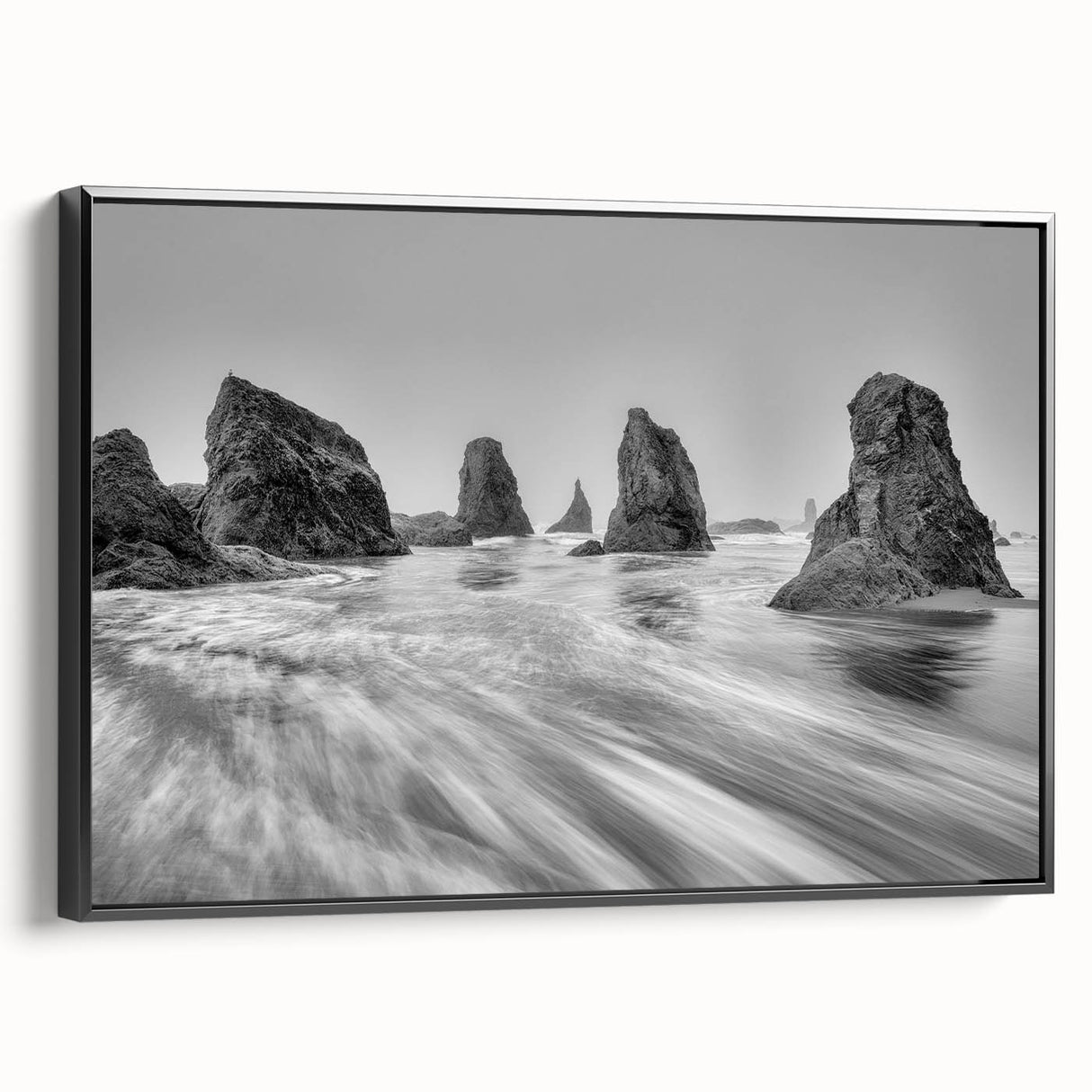 Framed canvas wall art from the Landscapes & Seascapes Design collection, showcasing a serene coastal view with vibrant colors and a sleek black frame, perfect for home decor.