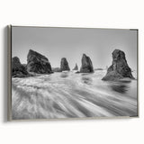 Framed wall art featuring a serene seascape design, showcasing gentle waves and a calming color palette of blues and grays, perfect for coastal decor.