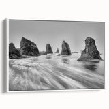 Framed canvas artwork from the Landscapes & Seascapes collection showcasing serene ocean waves in soft blues and whites, perfect for coastal home decor.