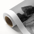 Rolled canvas artwork showcasing a vibrant seascape with rich blues and greens, ideal for coastal-themed decor, packaged securely for delivery.