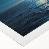 Rolled canvas artwork showcasing a vibrant seascape design with calming ocean blues and soft sandy tones, perfect for enhancing any coastal-themed decor.