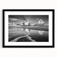 Framed black wall art showcasing a stunning seascape design with a white mat, perfect for coastal-themed home decor, displayed from the front view.